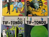 three books on a white surface with a cartoon character on them