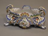 a decorative bowl that is sitting on a table