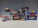 many different models of cars in a display case