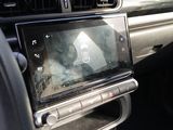 a car dashboard with a digital device in it