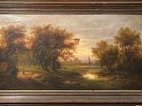 une peinture à l'huile représentant un paysage avec des arbres et une rivière au premier plan