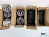 several boxes with different types of grinding wheels in them