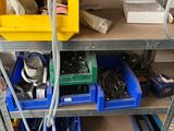 a shelf with many different types of tools on it