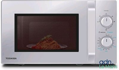 a white microwave with a plate of food inside of it