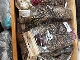 many bags of nuts in a wooden box