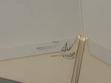 a piece of paper that has been left on the floor
