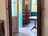a mirror that is sitting on a table in a room