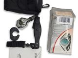 a black bag and a pair of clamps and a pair of scissors