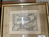 a picture of a picture of a map in a gold frame