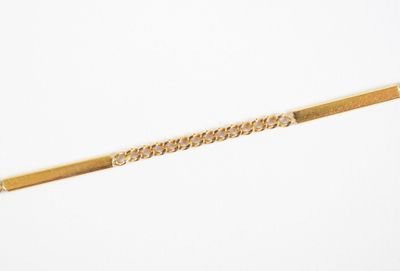 a gold tie bar that is attached to a tie bar
