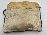 an old bag with a small piece of cloth on it