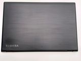 a black laptop with the word toshiba on it