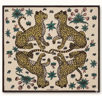 a painting of three leopards in a circle surrounded by flowers and leaves