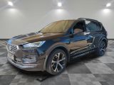 a blue 2020 hyundai santa limited suv parked on a checkered floor
