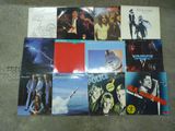 various album covers of various movies on a floor