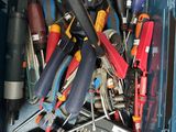 many different tools in a blue box on the table