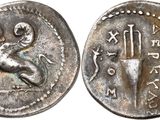 a silver coin with an image of a man on it