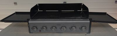 an image of a bbq grill in a garage