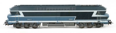 a blue and white train on the tracks on a white background