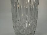 a glass cup that is sitting on a table