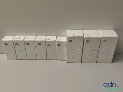a group of white boxes sitting next to each other on a table