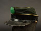 hat on a mannequin head on a black background