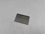a close up of a plastic card holder on a white surface