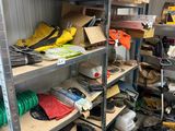 many boxes and boxes on the shelves in the garage