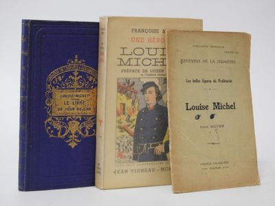 three books are lined up on a white surface, one is blue and the other is yellow