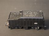 a small toy train sitting on a table