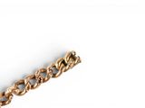 a close up of a gold chain on a white surface