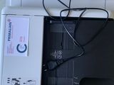 a printer that is sitting on top of a table