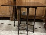 two tables that are sitting on the floor