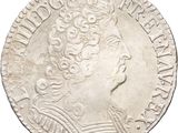 a close up of a coin on a white background