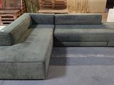 a couch that is sitting in the middle of a room
