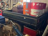 an image of a garage with a truck in it