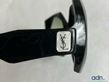 saint laurent sunglasses with a monogram on the side of them