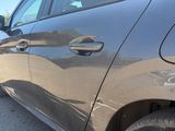 a close up of a car ' s door handle on the side of the car