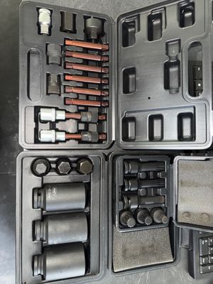 a lot of tools in the case on the table