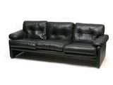 an image of a black leather couch on a white background