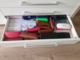a drawer that has a lot of items in it