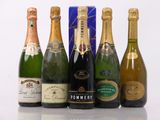 six bottles of champagne are lined up in a row on a table