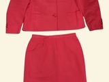 red jacket and skirt suit with buttons and buttons on the front