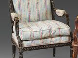 pair of early 20th century carved and upholstered armchairs