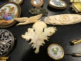 a table with a lot of antique items on it