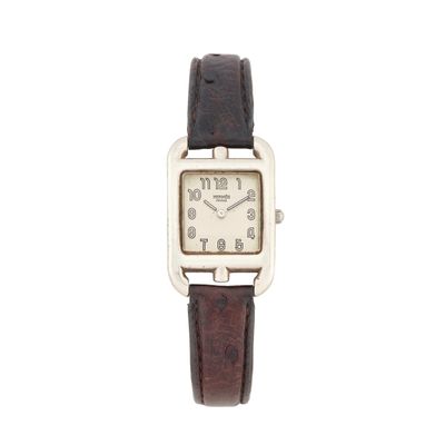 une photo d'une montre-bracelet pour femme avec un bracelet en cuir marron