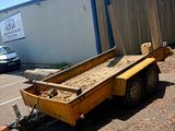 an image of a trailer parked in front of a building