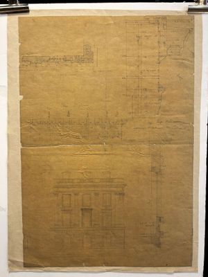 a piece of paper with a drawing of a building on it