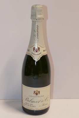 a bottle of wine that is sitting on a table