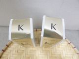 two boxes that have the letters k and k on them